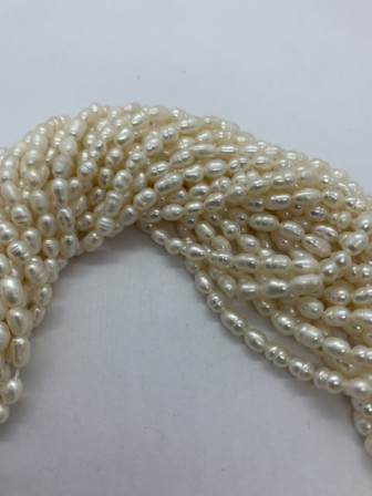 white oval fresh water pearls